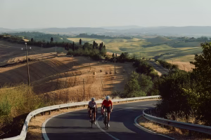 Two cyclists in Crete Senesi.